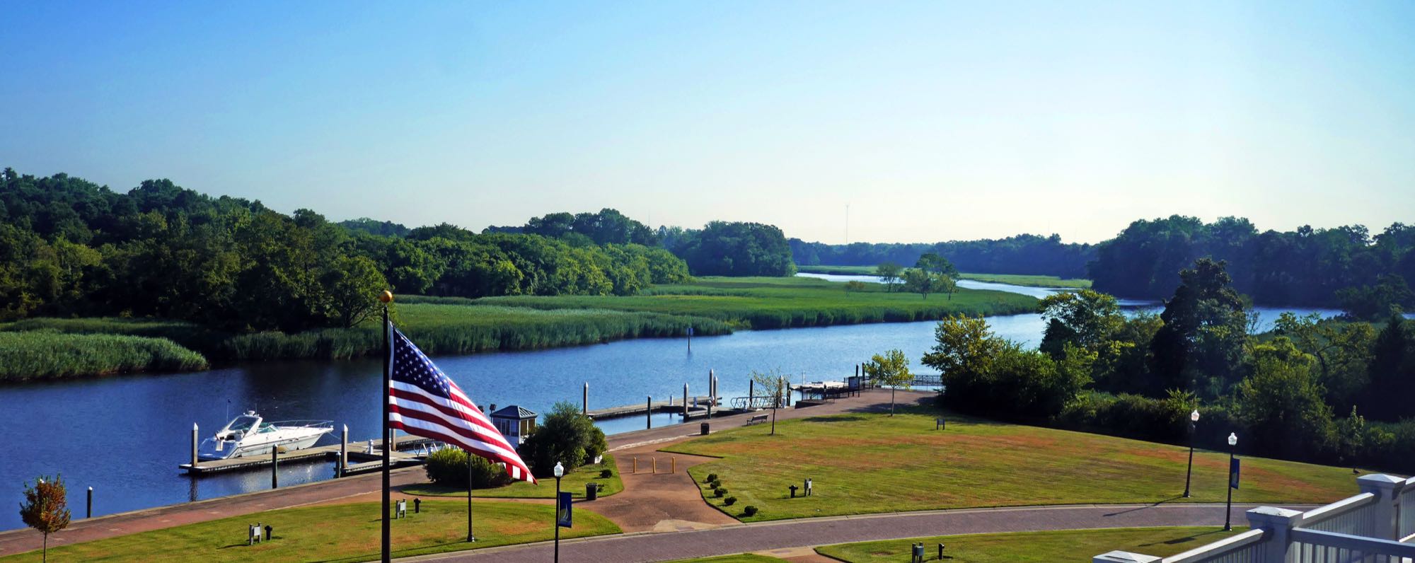 A marina and dock on the Nansemond River, Suffolk, with marsh grass along the banks